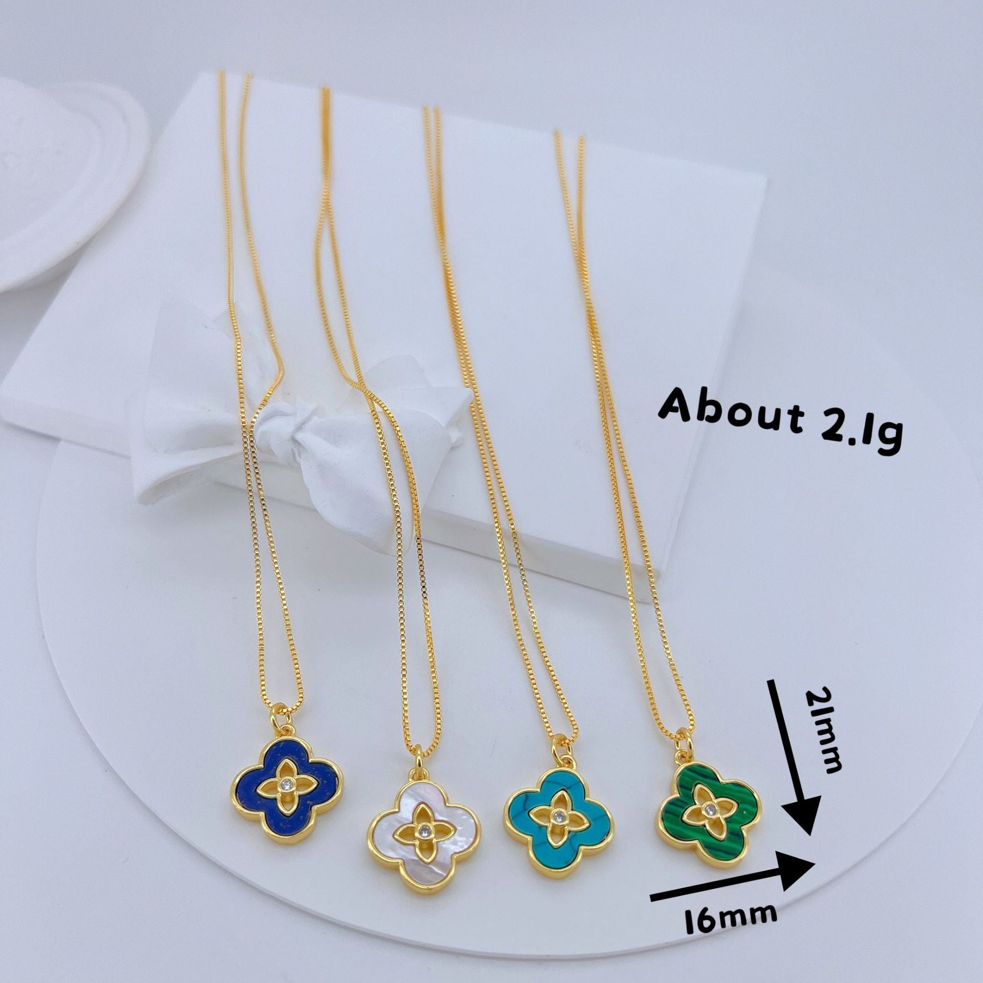 Cross-border hot selling fashion four-leaf clover pendant micro-inlaid zircon turquoise white fritillary necklace female clavicle chain pendant wholesale